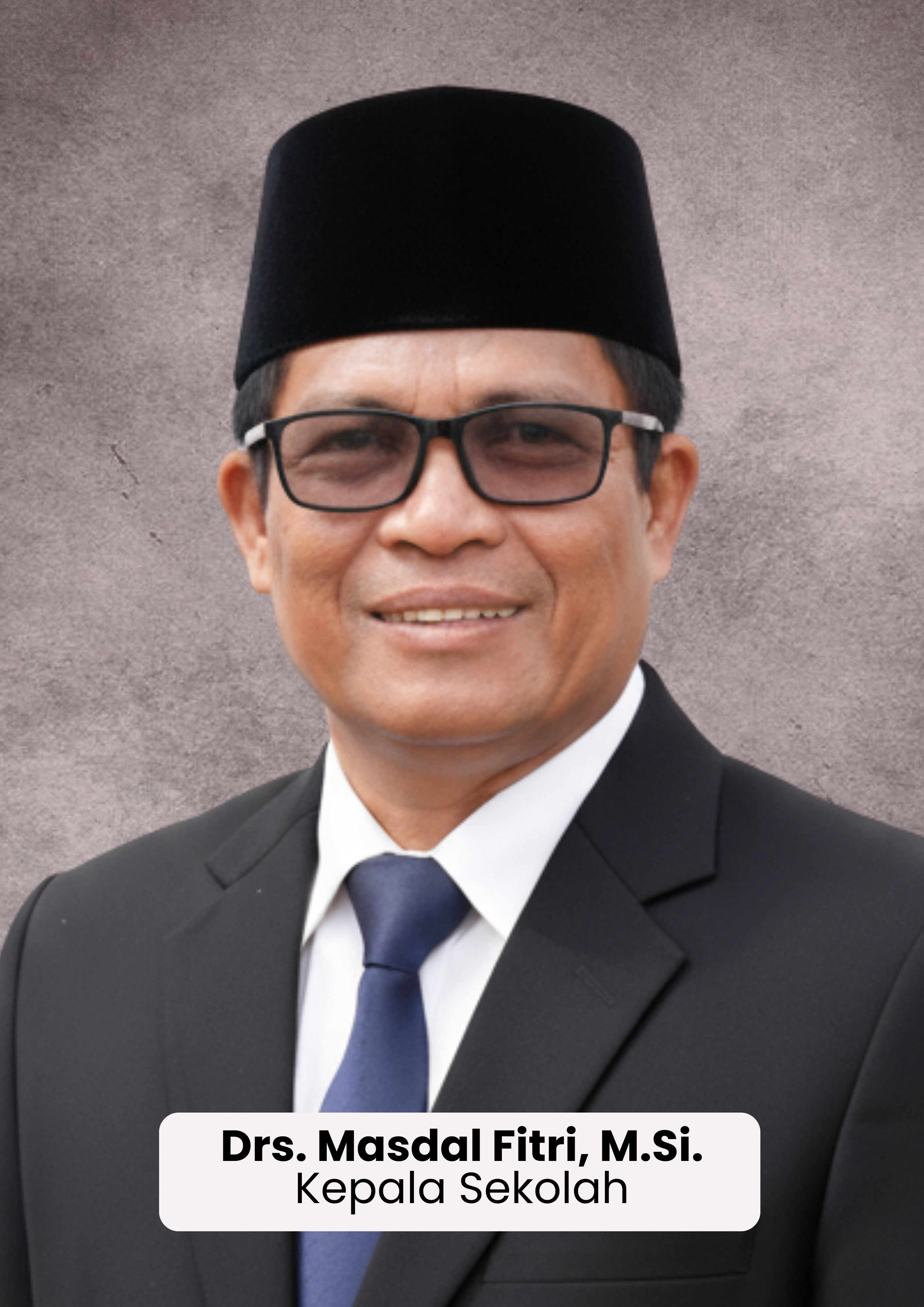 Drs. Masdal Fitri, M.Si.